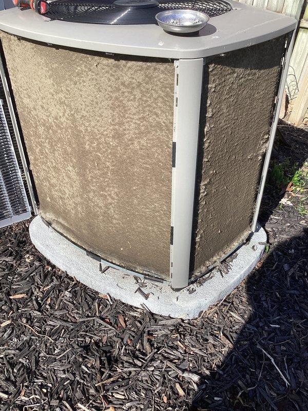 Completed scheduled air conditioning maintenance on residential outdoor condenser unit. Replaced air filter as identified spot item and confirmed as customer-owned device. Unit exterior shows normal weathering with accumulated dirt and debris on panels; condenser coils and fan grille inspected and found operational. System running within normal parameters upon completion of maintenance visit.