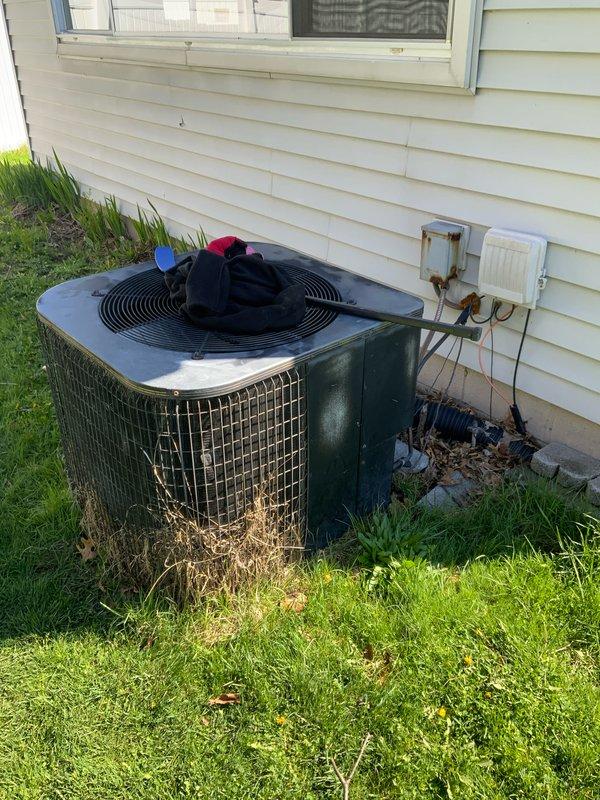 Conducted comprehensive assessment of residential HVAC system with two existing air conditioning units and non-functional heating equipment. Evaluated 15-year-old AC condenser units positioned at exterior locations, documenting equipment condition, refrigerant line routing, electrical connections, and associated infrastructure. Provided replacement estimate for complete system overhaul to restore cooling and heating capabilities to residence that has been without functional heat for extended period.