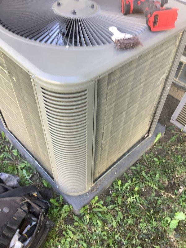Completed routine maintenance on a 5-year-old central air conditioning system that was operating properly. Performed comprehensive inspection of outdoor condensing unit, cleaned condenser coil and fan assembly, checked refrigerant lines and connections, and verified proper system operation. Unit showed normal wear consistent with age and outdoor exposure; all components functioning within manufacturer specifications with no issues identified.