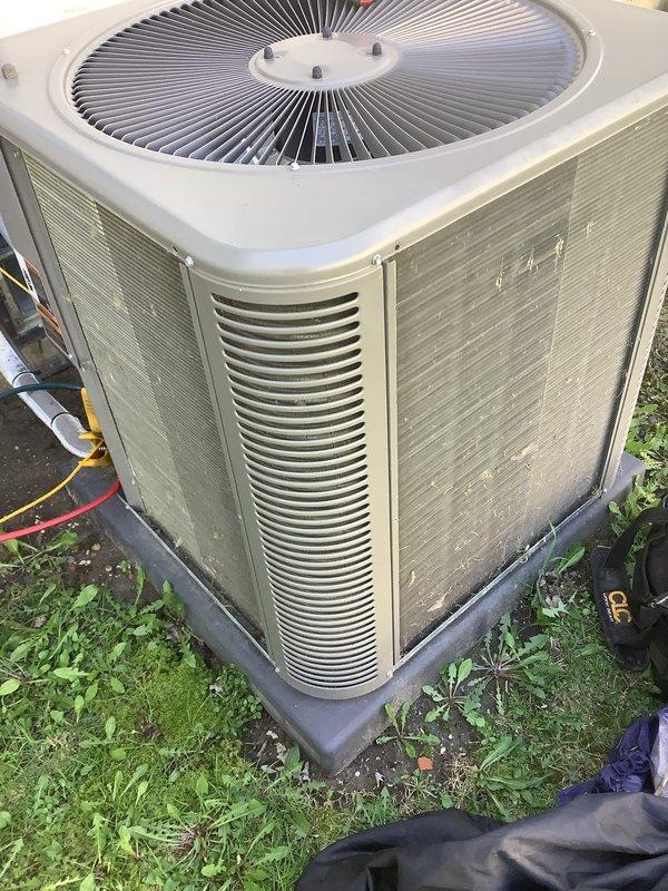 Completed routine maintenance on a 5-year-old central air conditioning system that was operating properly. Performed comprehensive inspection of outdoor condensing unit, cleaned condenser coil and fan assembly, checked refrigerant lines and connections, and verified proper system operation. Unit showed normal wear consistent with age and outdoor exposure; all components functioning within manufacturer specifications with no issues identified.