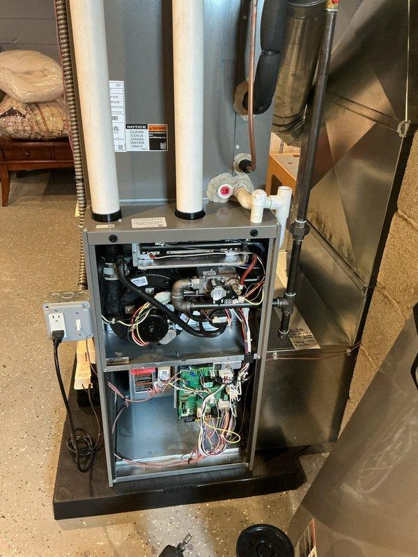 Completed comprehensive ComfortGuard maintenance visit on residential gas furnace system, including inspection of blower motor assembly, gas valve, burner components, and control board connections. Replaced humidifier pad as specialty service requirement and verified all electrical connections, safety controls, and PVC venting system for proper operation. System tested and confirmed operating within manufacturer specifications with all components functioning correctly.