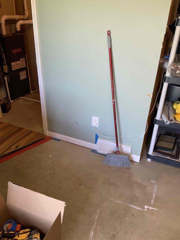 Completed full HVAC system installation in residential basement utility room, including new furnace unit with associated PVC venting and condensate drainage piping, air filter housing with proper airflow configuration, and necessary electrical connections. System was installed against existing masonry wall with all required safety labels and manufacturer specifications properly displayed, ensuring code-compliant operation and efficient heating performance.