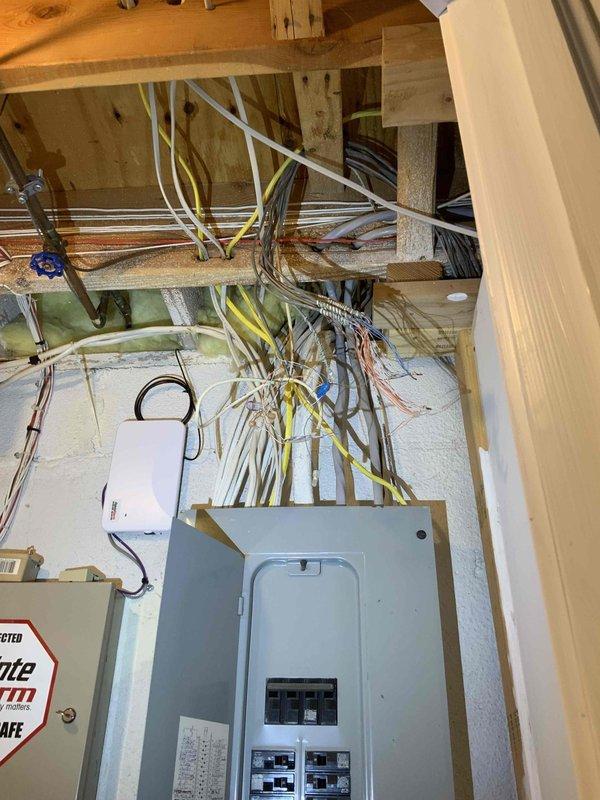 Conducted full system estimate for non-operational air conditioning unit original to 1999 construction. Inspected existing HVAC equipment in basement utility area, including furnace, ductwork distribution system, and electrical service panel connections. Documented current system configuration with exposed mechanical infrastructure, spray foam insulation installation, and existing ventilation routing. Assessed 16-year-old AC system failure and provided comprehensive replacement options for complete HVAC system upgrade to meet immediate replacement timeline within the next couple weeks.