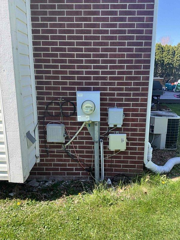 Provided comprehensive estimate for replacement of 22-year-old air conditioning system currently located at exterior of residence on concrete pad adjacent to brick foundation. Existing unit remains operational but has reached end of expected service life. Assessment included evaluation of current outdoor condenser unit, electrical service connections, refrigerant line set, and condensate drainage system routed along exterior wall. Reviewed basement-located natural gas furnace for compatibility with proposed air conditioning replacement to ensure proper system integration and optimal performance of complete HVAC system.