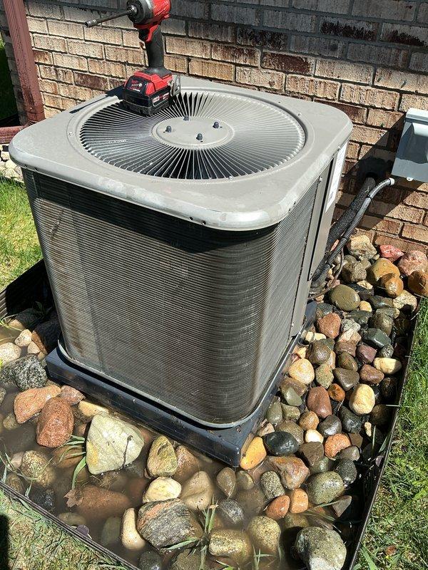Completed annual cooling maintenance on residential air conditioning condenser unit. Performed comprehensive system inspection, cleaned condenser coils, checked refrigerant lines and insulation for proper condition, verified electrical connections at disconnect box, and tested unit operation. All components found to be functioning within normal parameters with no issues identified.