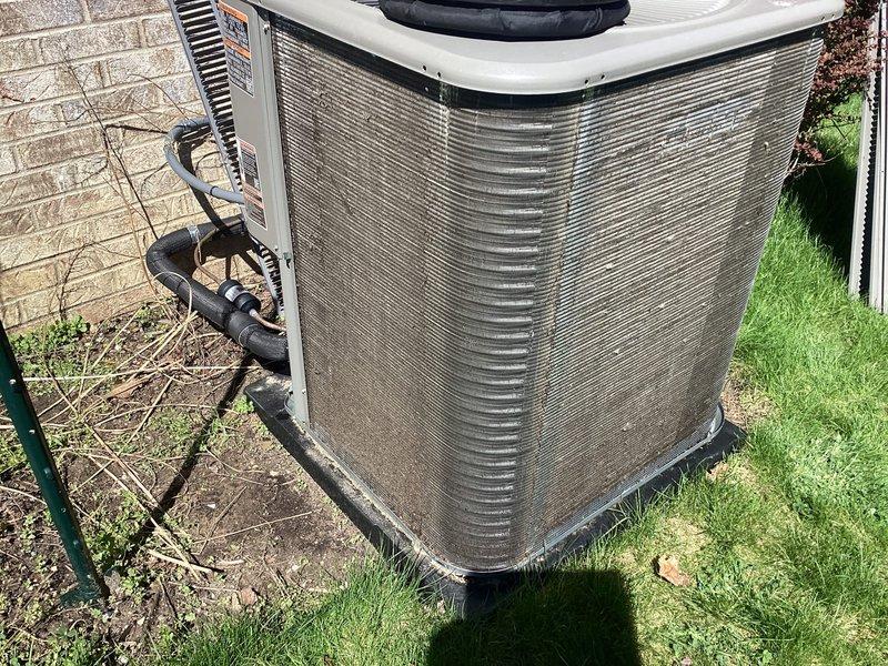 Completed routine air conditioning maintenance on residential cooling system. Performed comprehensive tune-up including inspection of outdoor condenser unit, verified refrigerant line integrity, cleaned condenser coils and fins to remove accumulated debris, checked electrical connections, and confirmed proper system operation. Unit found in good working condition with no deficiencies noted.