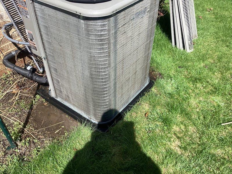 Completed routine air conditioning maintenance on residential cooling system. Performed comprehensive tune-up including inspection of outdoor condenser unit, verified refrigerant line integrity, cleaned condenser coils and fins to remove accumulated debris, checked electrical connections, and confirmed proper system operation. Unit found in good working condition with no deficiencies noted.