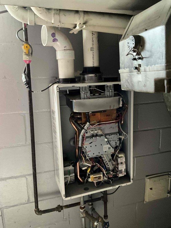 Provided comprehensive estimate for replacement of basement-located HVAC system including furnace and air conditioning unit. Current equipment dating from 2014 is experiencing operational issues and requires replacement. Evaluated existing installation including electrical panel configuration, venting infrastructure with PVC exhaust systems, and current mechanical room layout to determine optimal replacement specifications and compatibility requirements for new equipment installation.