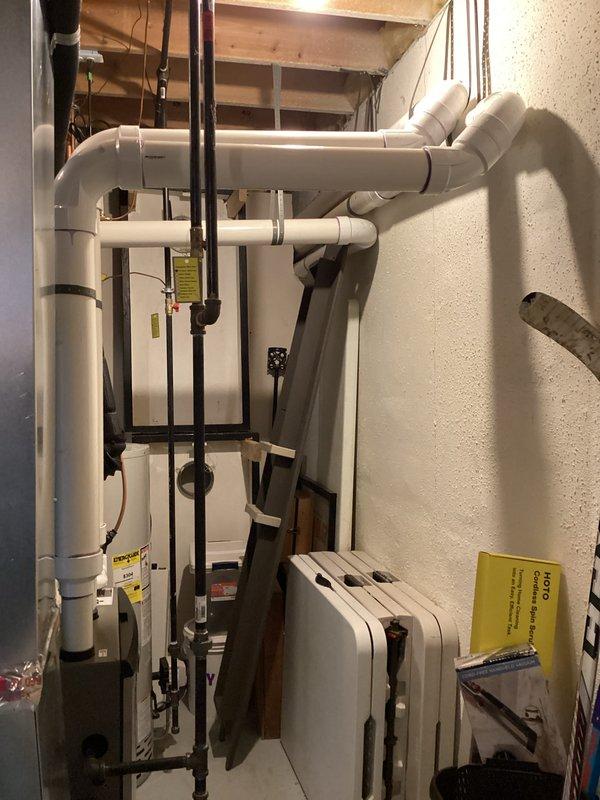 Completed full HVAC system installation including 110,000 BTU furnace and 4-ton air conditioning unit with right-side placement. Installation included mechanical and electrical permits, proper PVC condensate drainage configuration with floor drain connection, and reconnection of all existing utility services. All equipment installed per manufacturer specifications with appropriate venting, electrical connections secured, and system tested for proper operation upon completion.