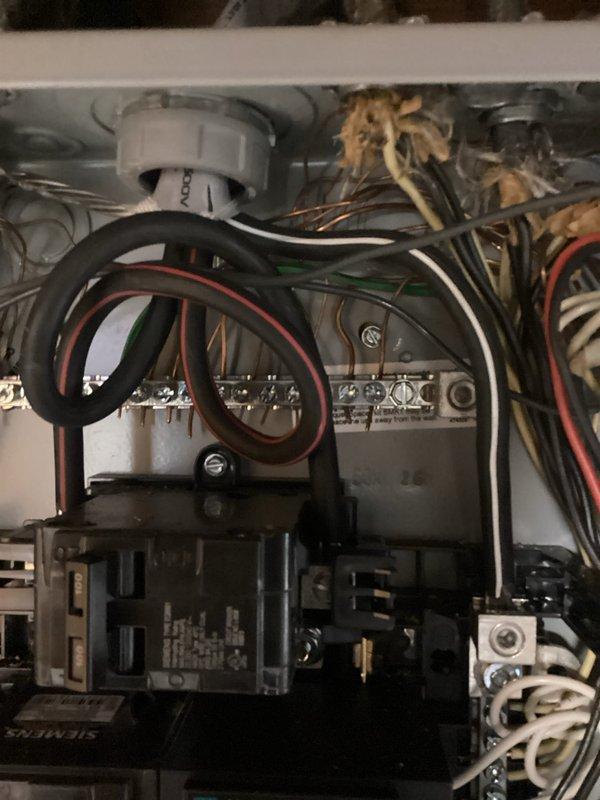 Completed electrical panel violation repairs per recall notice. Addressed code compliance issues by properly securing and organizing multiple circuit conductors, ensuring all wire terminations at breaker box and terminal blocks met current NEC standards. Reorganized bundled wiring, verified proper grounding connections, and confirmed all circuit breakers were correctly installed and operational within the main distribution panel.