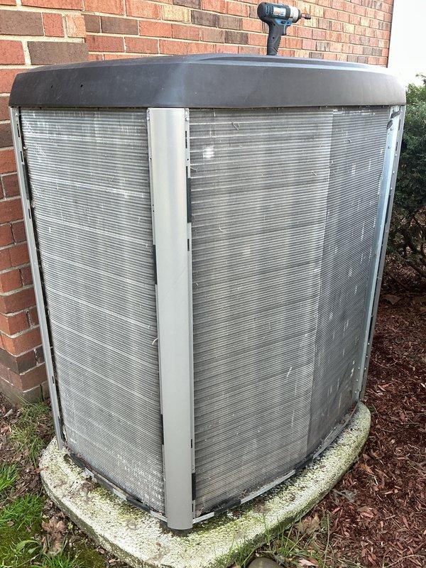 Completed spring AC tune-up on 6-year-old Lennox condensing unit. Performed comprehensive maintenance including inspection of all components, cleaning of condenser coils with accumulated debris and organic matter, checked refrigerant levels, tested electrical connections, and verified proper system operation. Unit was found in working condition with normal seasonal buildup on exterior fins; cleaned and restored to optimal performance specifications.