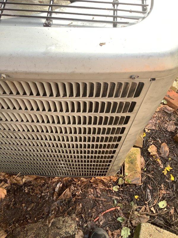 Completed routine ACM maintenance on outdoor condenser unit. Unit was inspected and found operational with significant debris accumulation around base and dirty condenser coils requiring attention. Cleared leaves, mulch, and landscaping debris from around equipment base and removed obstructions to ensure proper airflow and prevent future operational issues.