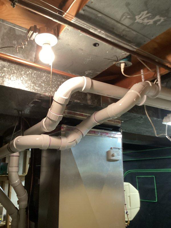 Completed full HVAC system installation including a 110,000 BTU furnace and 4-ton air conditioning unit with right-side configuration. Installed new PVC condensate drainage system with proper pitch and routing through basement ceiling joists, connected to existing drain lines. Ran new supply and return ductwork utilizing galvanized metal trunk lines and flexible duct branches, securing all connections to floor joists. Established proper refrigerant line set routing with copper piping, installed electrical disconnects and wiring for both units, and reconnected all system components to existing infrastructure. All mechanical permits were obtained prior to installation, and system was tested for proper operation upon completion.