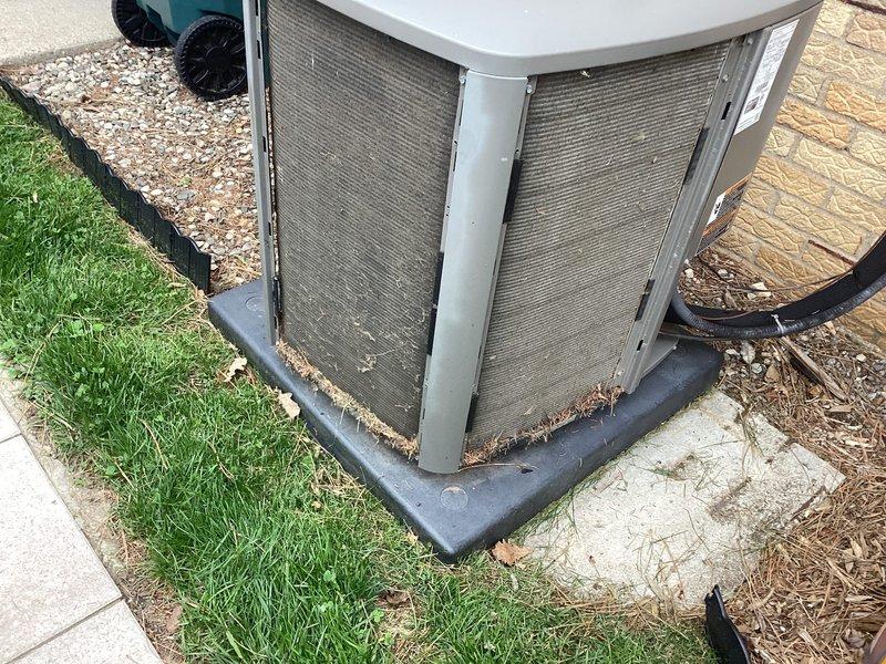 Completed scheduled air conditioning maintenance on outdoor condensing unit. Performed inspection of condenser coils, which showed significant accumulation of dirt and debris, and cleaned coils to restore proper airflow and heat transfer efficiency. Verified unit operation, checked refrigerant lines, and confirmed system is functioning properly for the cooling season.