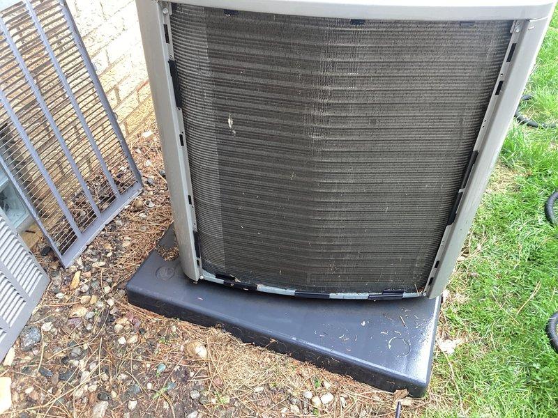 Completed scheduled air conditioning maintenance on outdoor condensing unit. Performed inspection of condenser coils, which showed significant accumulation of dirt and debris, and cleaned coils to restore proper airflow and heat transfer efficiency. Verified unit operation, checked refrigerant lines, and confirmed system is functioning properly for the cooling season.