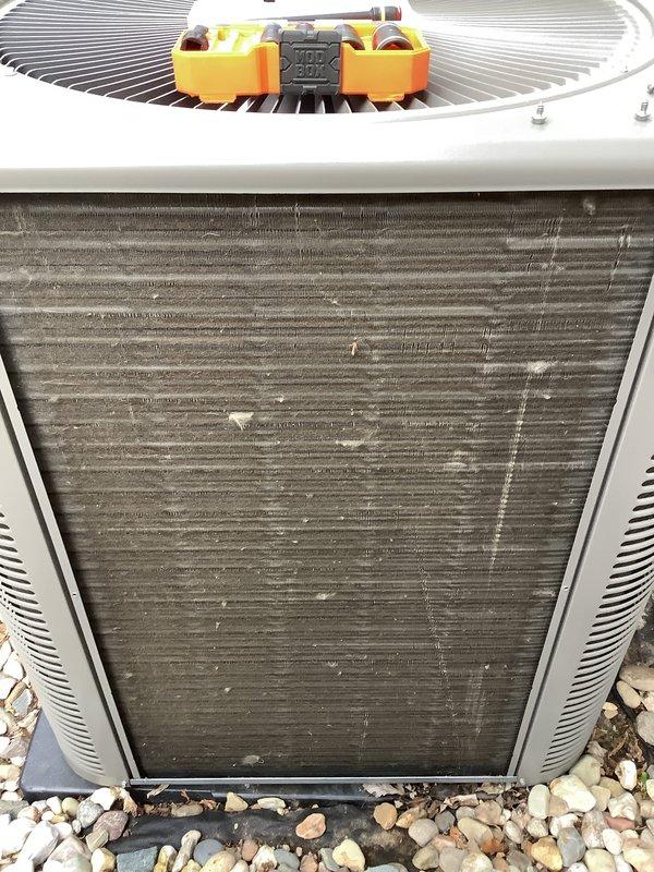 Completed routine Air Care Maintenance on residential air conditioning system. Performed standard ACM procedures including inspection of outdoor condenser unit, replaced air filters as requested, and conducted operational testing with diagnostic equipment. Condenser coils showed moderate dirt and debris accumulation with visible dust buildup between fins; cleaned coil surfaces to restore proper airflow and heat transfer efficiency. Unit operational and running within normal parameters upon completion.