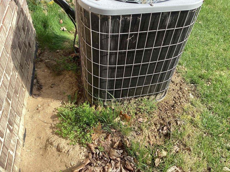 Completed routine Air Care Maintenance on residential outdoor condensing unit. Performed comprehensive system inspection, documenting unit condition and surrounding area. Unit operational with protective grille and top cover intact, refrigerant lines secure at connection points.