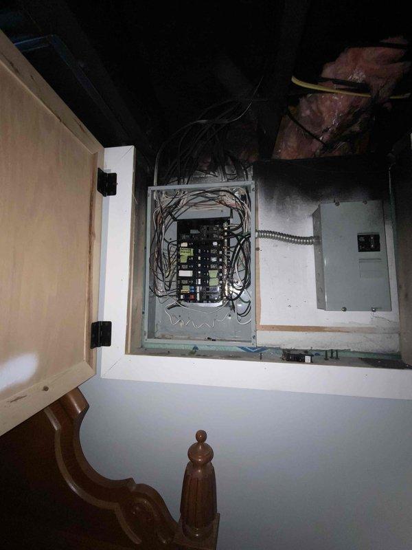 Conducted comprehensive estimate for complete air conditioning system replacement. Existing AC unit exhibiting refrigerant line freezing and inadequate cooling capacity, unable to maintain temperature below 74°F. System age unknown but confirmed to be significantly aged beyond serviceable lifespan. Inspected current installation including air handler with 3M Filtrete 16x25x5 filter assembly, ductwork connections, and electrical service panel configuration in basement utility area. Documented existing equipment conditions and infrastructure to provide accurate replacement specifications and installation requirements for new high-efficiency cooling system.