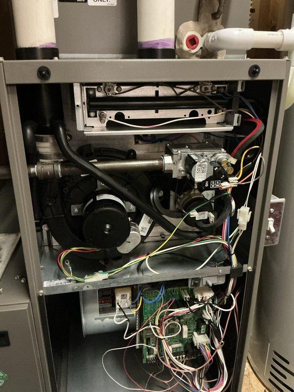 Completed annual heating care maintenance on residential HVAC system. Performed comprehensive inspection of outdoor condenser unit and indoor furnace components, replaced air filter, verified proper operation of all mechanical and electrical systems including burner assembly, blower motor, gas valves, and control board connections.