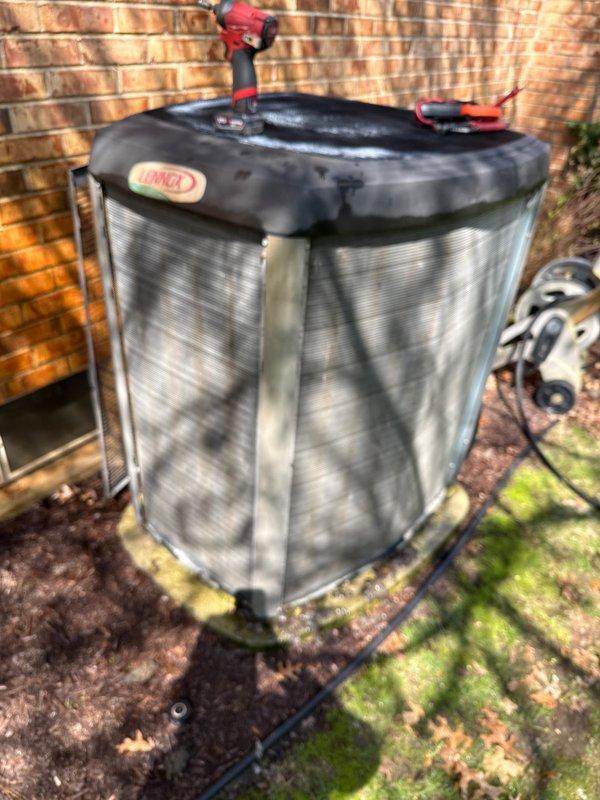 Completed routine preventive maintenance on a 10-year-old Linux brand air conditioning system. Performed comprehensive inspection of outdoor condenser unit, including visual assessment of cabinet condition, refrigerant line connections, and mounting pad stability. Cleaned condenser coils and removed debris from unit exterior. Checked electrical connections and verified proper component operation. Inspected condensate drainage system and confirmed adequate airflow clearance around unit. System operating within normal parameters with no deficiencies noted at time of service.