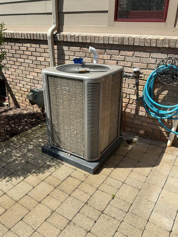 Completed routine maintenance on residential air conditioning system. Replaced air filter and evaporator pad as needed, inspected outdoor condenser unit for proper operation, and verified all components functioning correctly.