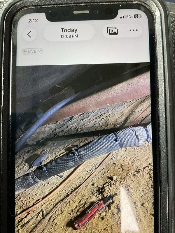 Responded to installation callback for leaking braze joint located 15-20 feet inside crawlspace, accessed via rear entrance of home. Repaired failed brazed connection on refrigerant line, evacuated system to 414 microns to verify integrity, and confirmed leak-free operation. System tested and returned to normal operation.
