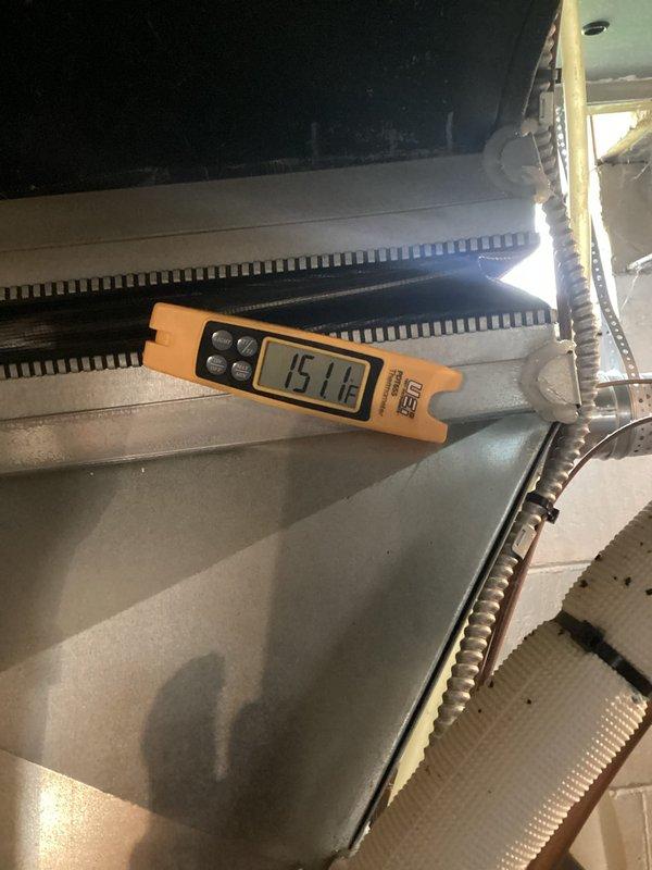 Responded to callback for newly installed thermostat with furnace displaying alert code 11 on six-year-old forced air system. Performed diagnostic testing and temperature measurements at evaporator coil (15.18°F) and supply register (122.78°F) to verify system operation and rule out thermostat programming issues. Determined furnace alert code was equipment-related rather than thermostat installation error, cleared code, and confirmed system returned to normal heating operation with proper temperature differential.