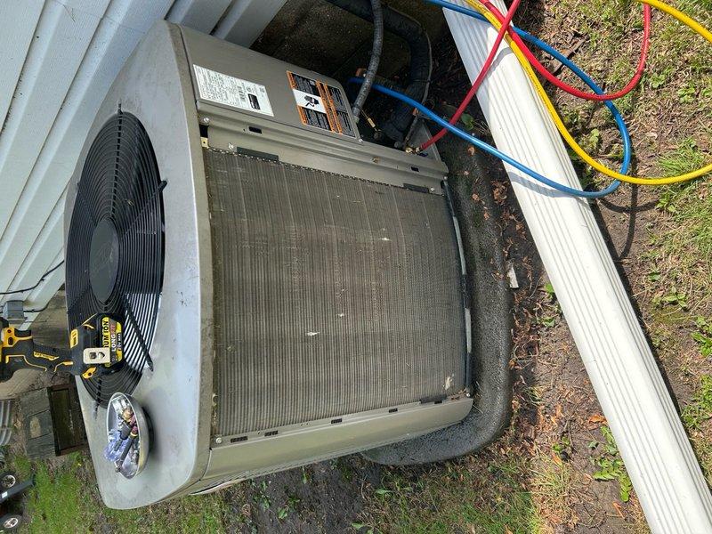 Completed annual preventive maintenance on residential split system air conditioning unit. Performed comprehensive inspection of outdoor condenser unit including verification of refrigerant pressures using manifold gauge set, visual assessment of condenser coil condition, fan motor operation check, and electrical connection inspection. Unit found operating within normal parameters with no immediate service needs identified.