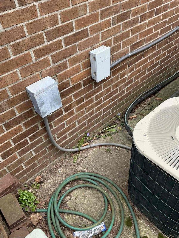 Conducted estimate for replacement of 16-year-old Arcoaire unit located in courtyard area that was found to be out of refrigerant. Assessed existing system configuration including exterior-mounted condensing unit on concrete pad with associated refrigerant lines and electrical connections, documented equipment condition and installation site for replacement proposal.