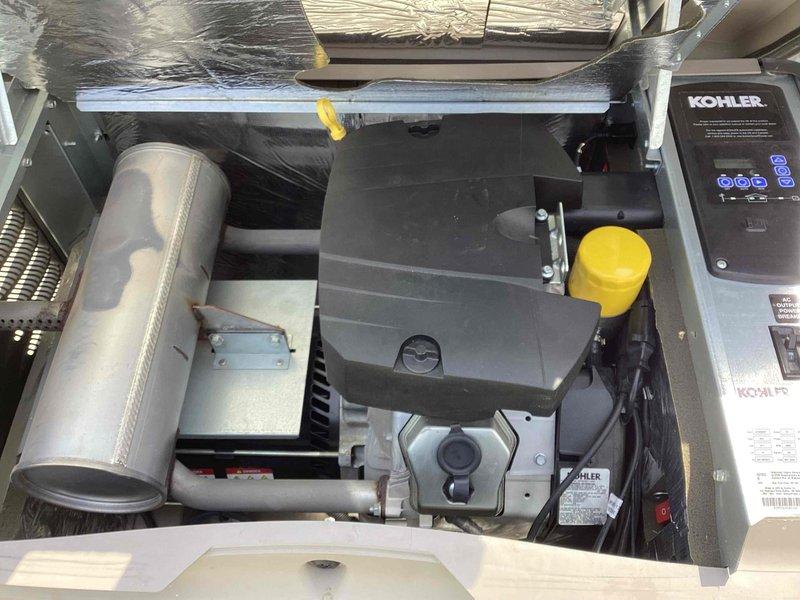 Performed scheduled maintenance on a 20kW Kohler standby generator system. Conducted comprehensive inspection of engine compartment, verified proper operation of control panel with illuminated indicators, checked battery condition and serviced battery fluid levels using appropriate filling equipment. All mechanical components, exhaust system, and ventilation ductwork inspected and found in satisfactory operating condition.