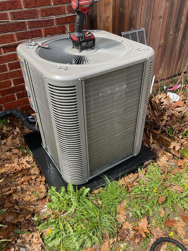 Completed annual cooling maintenance on residential outdoor condenser unit. Performed comprehensive system inspection, tested electrical components with multimeter, verified proper amperage draws, and checked refrigerant pressures. Cleaned condenser coils, secured access panels with power tools, and confirmed fan motor operation and airflow through louvers.