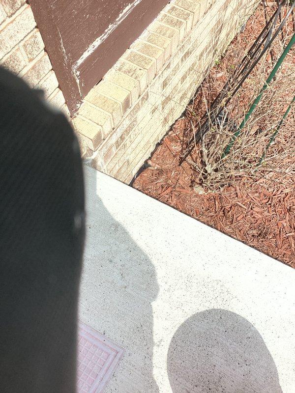Responded to callback regarding exhaust piping from recently installed 70,000 BTU furnace causing heat damage to vinyl siding. Inspected vent termination and clearances, documented siding warping with photos showing affected area near foundation and landscaping. Assessed exhaust pipe positioning and heat shield requirements to prevent further damage to building materials.