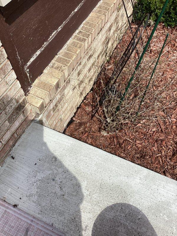Responded to callback regarding exhaust piping from recently installed 70,000 BTU furnace causing heat damage to vinyl siding. Inspected vent termination and clearances, documented siding warping with photos showing affected area near foundation and landscaping. Assessed exhaust pipe positioning and heat shield requirements to prevent further damage to building materials.