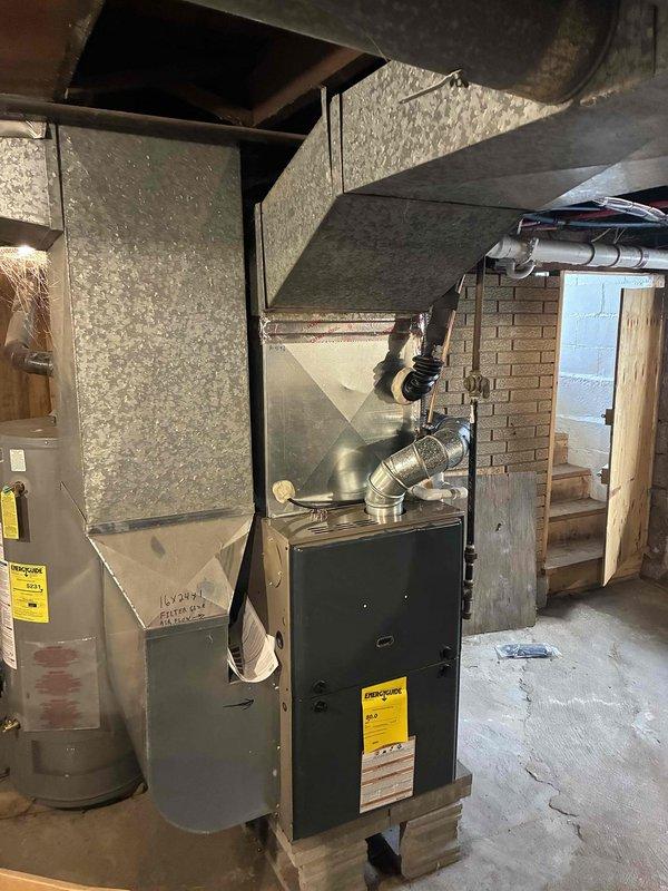 Successfully installed a 2-ton air conditioning system with matching evaporator coil in basement utility area. Established new dedicated electrical circuit to code specifications and completed all mechanical and electrical connections to existing furnace system. All permits obtained and installation completed per manufacturer specifications with system tested and operational.