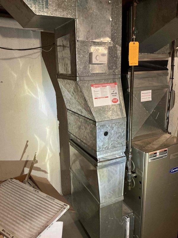 Conducted full system estimate for replacement of existing Carrier furnace and air conditioning unit, both over 16 years old and approaching end of serviceable life. Assessed current basement installation including ductwork configuration, electrical connections, condensate drainage, and clearance requirements. Provided comprehensive replacement options for complete HVAC system upgrade to meet customer's timeline of replacement within one month.