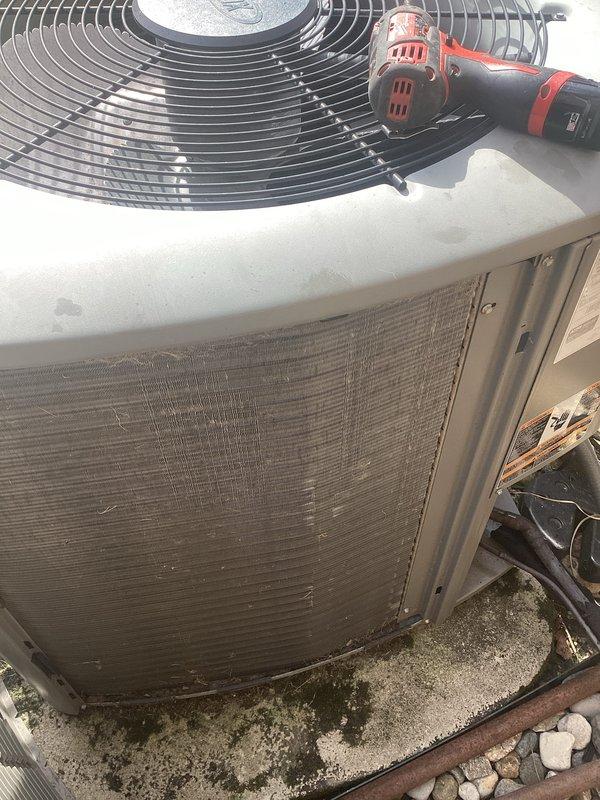 Performed routine maintenance on two outdoor air conditioning condenser units. Conducted thorough inspection of both systems, cleaned condenser coils which showed significant dirt and debris accumulation, and verified proper operation of fan motors and compressors. Cleared debris from base pads and surrounding areas to ensure adequate airflow and drainage. All refrigerant lines, electrical connections, and mechanical components inspected and found to be functioning within normal parameters upon completion of preventive maintenance service.