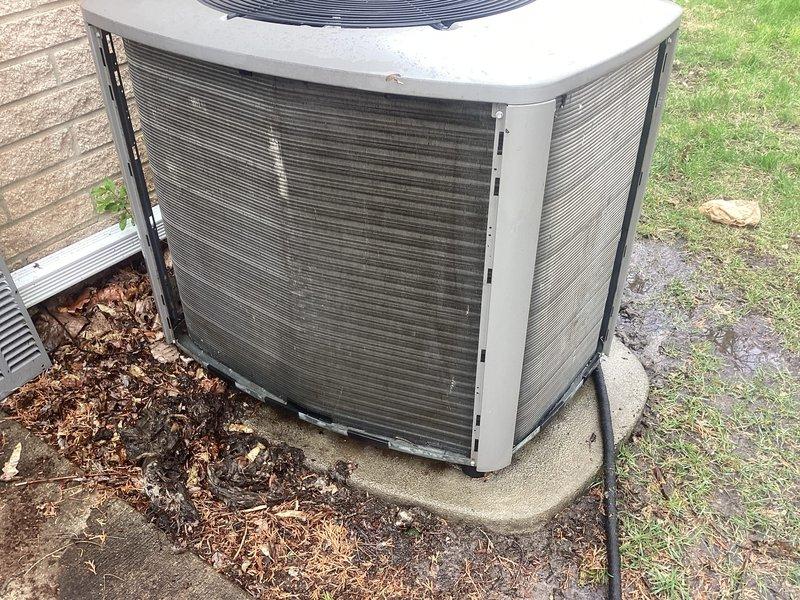 Completed annual cooling maintenance on residential air conditioning system. Performed comprehensive inspection of outdoor condensing unit, noting significant exterior deterioration with extensive rust, corrosion, and peeling paint on metal panels requiring future attention. Conducted operational testing with multimeter to verify electrical performance, checked refrigerant levels, inspected condenser coils through protective grilles, and confirmed proper fan operation. Unit remains functional despite cosmetic deterioration from weather exposure and age.