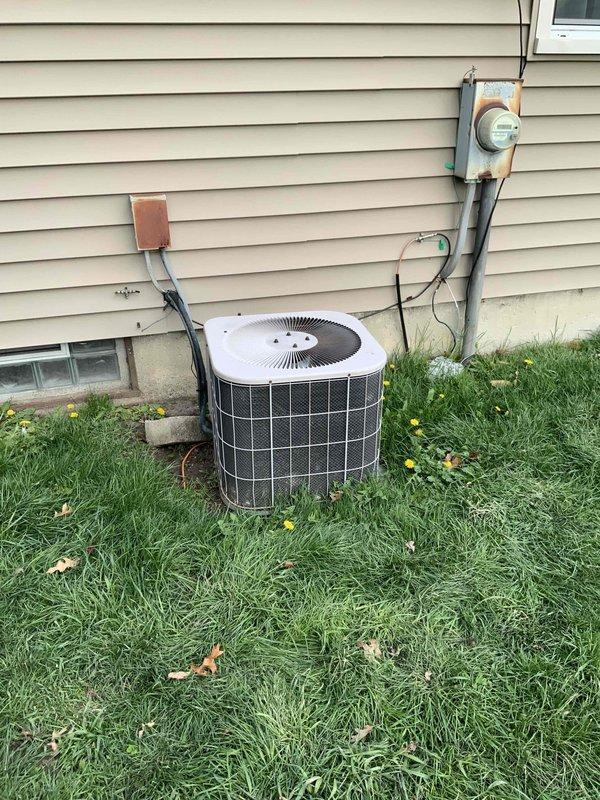 Conducted comprehensive full system estimate for HVAC replacement at residential property with 16-year-old furnace and air conditioning equipment. Evaluated existing outdoor AC unit with cylindrical configuration and assessed basement mechanical room housing current water heater and HVAC infrastructure, noting exposed ductwork, copper plumbing lines, and available space for high-efficiency equipment installation. Provided recommendations for complete system upgrade to meet customer's energy efficiency goals in coordination with planned roof and window replacement project.