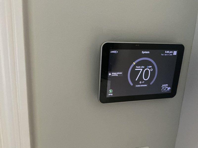 Completed AC tune-up on 2-year-old Lennox system. Performed standard maintenance procedures including filter inspection, refrigerant level check, electrical connection verification, and condensate drain evaluation. System operating properly with thermostat functioning correctly and all components running within normal parameters.