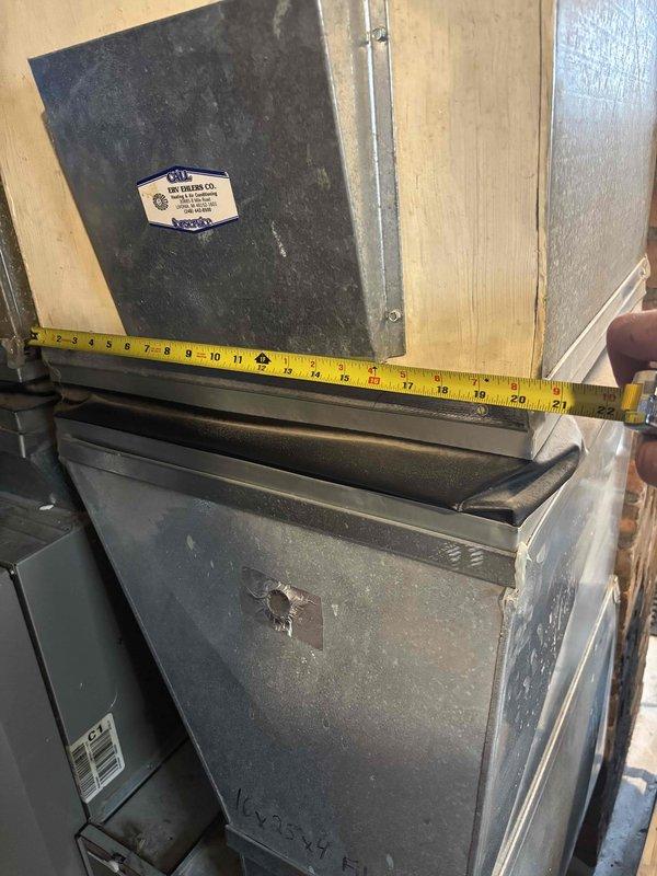 Conducted comprehensive site assessment for complete HVAC system replacement estimate including new air conditioning unit and natural gas furnace located in basement. Evaluated existing 10-year-old furnace, documented equipment dimensions and clearances, assessed ductwork configuration, and photographed current mechanical room layout including water heater proximity and copper piping infrastructure to determine optimal replacement equipment specifications and installation requirements.