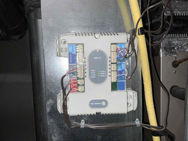 Provided comprehensive estimate for replacement of 15+ year old furnace and air conditioning system located in basement. Current equipment is operational but nearing end of service life. Assessment included evaluation of existing zone control system with multi-zone configuration, electrical panels, and ductwork infrastructure to ensure compatibility with proposed replacement equipment.