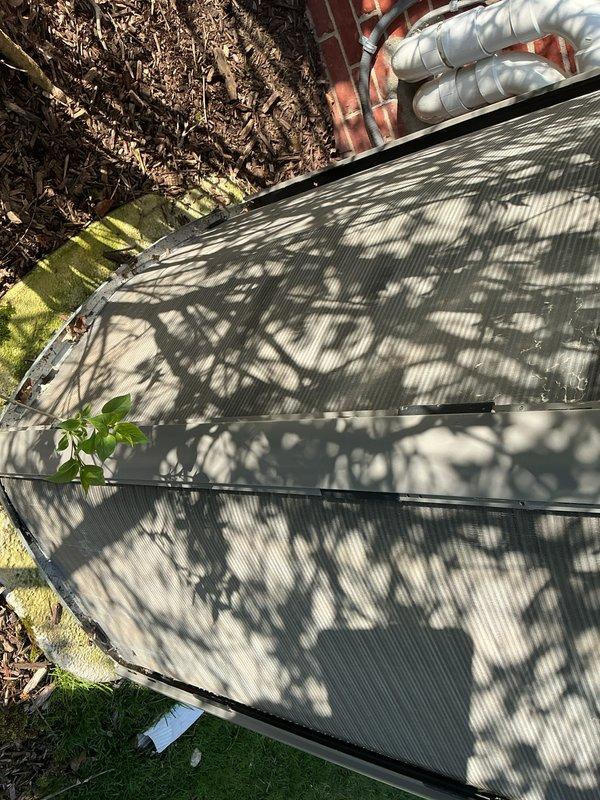 Completed annual cooling maintenance on residential air conditioning system. Performed comprehensive inspection of outdoor condenser unit, changed air filters and evaporator pads, and verified proper system operation. Unit showed normal wear with minor debris accumulation on coils; all components functioning within manufacturer specifications.