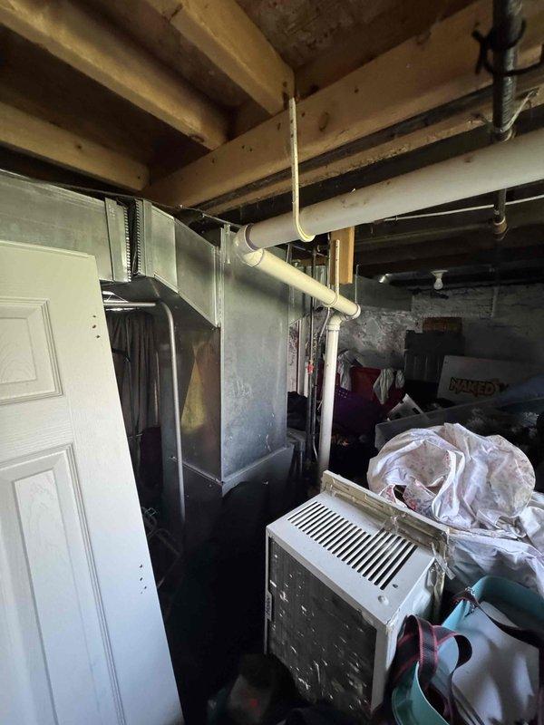 Completed estimate for new air conditioning system installation at property with no existing AC equipment. Assessed basement utility area housing existing furnace and water heater to determine optimal placement for new air handler and condensing unit. Evaluated existing ductwork infrastructure and electrical service capacity for system integration. Provided comprehensive quote for complete AC system installation including equipment, labor, and necessary modifications to existing HVAC infrastructure. Homeowner declined to proceed with financing at this time.