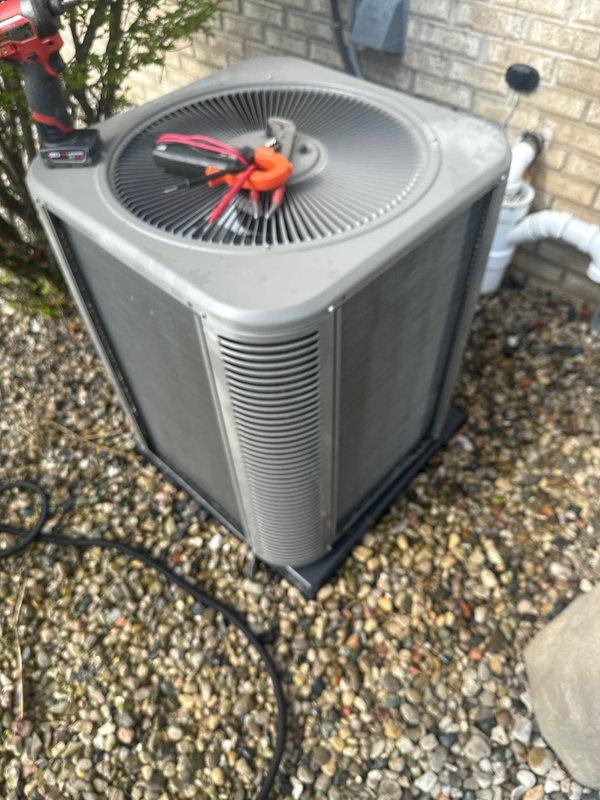 Completed annual cooling maintenance on residential outdoor condensing unit. Performed comprehensive inspection of fan assembly, motor components, and electrical connections, cleaned condenser coils and verified proper airflow through louvers, and confirmed unit operational status with all components functioning within manufacturer specifications.