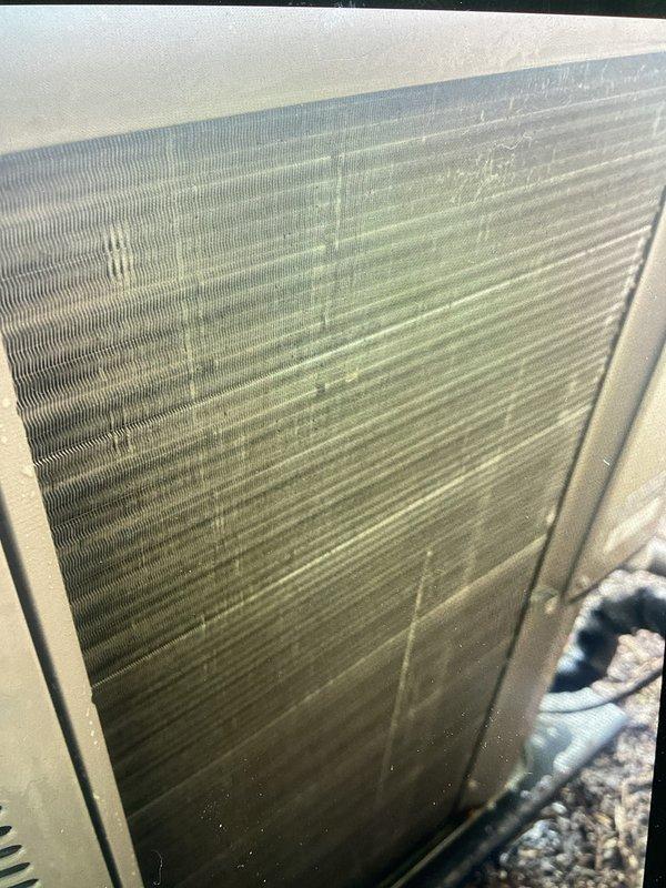 Completed Platinum Service summer maintenance on 9-year-old Lennox HVAC system. Performed comprehensive AC tune-up including inspection of condenser unit, which showed significant dirt and debris accumulation on coil fins requiring cleaning to restore optimal airflow and heat transfer efficiency. Exterior cabinet displayed weathering and organic growth from environmental exposure. System confirmed operational and functioning properly upon completion of preventive maintenance procedures.