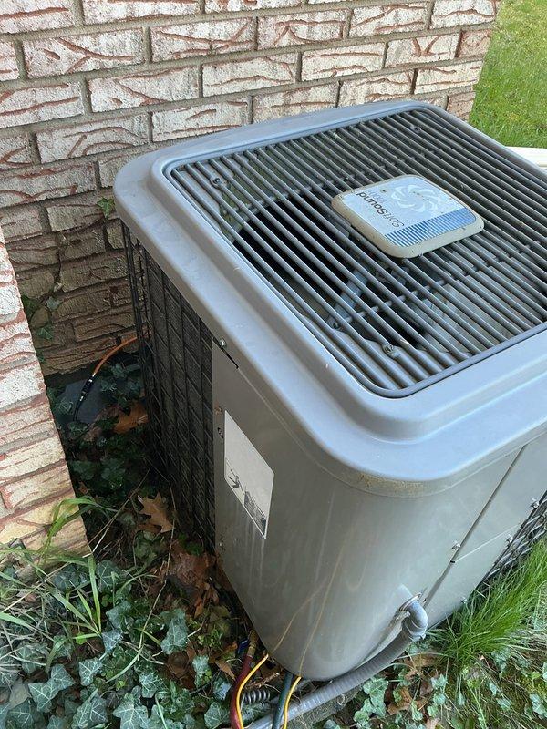 # HVAC Maintenance - Air Conditioning Unit

Performed scheduled preventive maintenance on residential outdoor air conditioning condensing unit. Conducted comprehensive inspection of electrical components including contactor, wiring connections, and control circuits. All electrical connections were found secure with proper voltage readings. Cleaned accumulated dirt and debris from internal electrical compartment to prevent potential component failure and ensure optimal operation.

Inspected condenser coil fins and top discharge grille for proper airflow. Verified unit is sitting level on concrete pad with adequate clearance from surrounding vegetation. Noted minor accumulation of leaves and organic debris around base of unit, which is typical for outdoor installations with nearby landscaping. Checked refrigerant lines and electrical conduit for proper support and protection.

Unit operational status confirmed with all safety controls functioning as designed. System operating within norm
