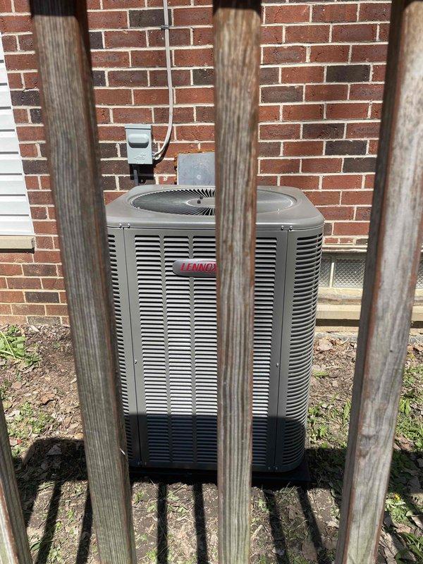 Successfully completed installation of a 2-ton Lennox ML14XC1-024 air conditioning system with matching CK4DCT-24B coil. Unit was positioned on a 30x30x3 concrete pad at rear of residence against brick exterior wall. Installation included reconnection of existing electrical service with 20-amp disconnect, 1/2-inch flex whip, and GFCI protection. Completed 3/4-inch PVC condensate drain line routing and installed new 3/4-inch lineset with proper insulation. All mechanical, electrical, and air conditioning permits were obtained prior to installation, and system was tested for proper operation upon completion.
