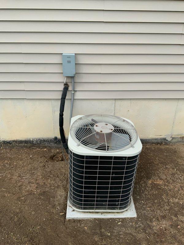 Conducted on-site assessment for air conditioning system replacement estimate. Evaluated existing HVAC equipment including indoor air handler/furnace unit located in basement mechanical room and outdoor condenser unit with associated refrigerant lines and electrical disconnect. Documented current system configuration, equipment condition, and installation setup. Photographed both indoor and outdoor components to provide comprehensive system evaluation for replacement options.