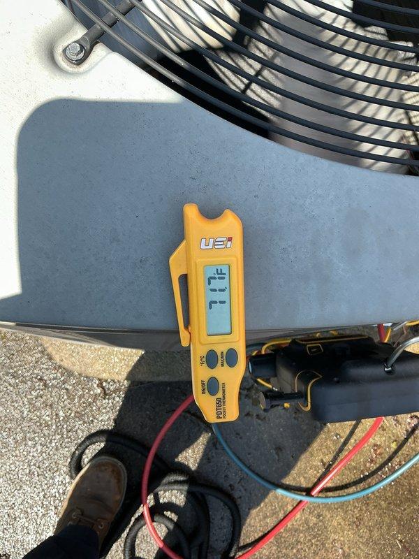 Completed routine Air Care Cooling maintenance on residential outdoor condensing unit. Performed comprehensive system diagnostics using digital multimeter, recording electrical readings and verifying proper voltage levels at 131V. Conducted visual inspection of condenser cabinet, fan assembly, and electrical connections to ensure optimal operating condition for continued system performance.