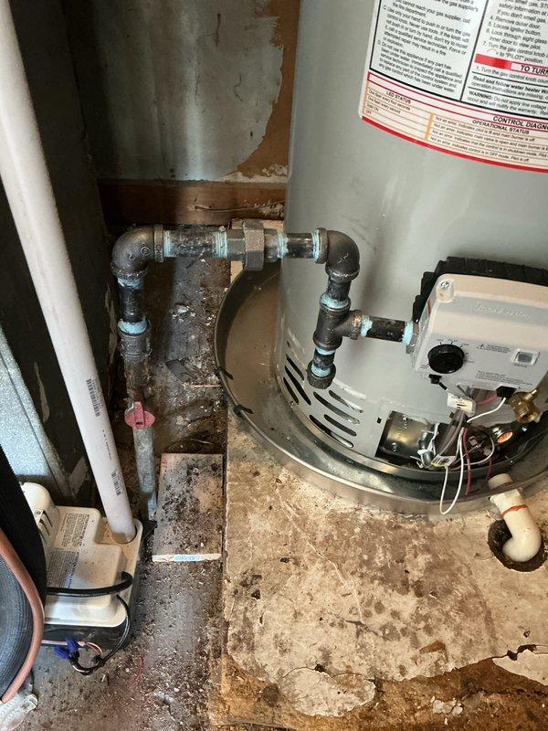 Successfully installed a 40-gallon Bradford White residential water heater in utility closet. Connected hot and cold water supply lines using PEX and copper piping, installed gas control valve and flue exhaust ventilation system, and completed all electrical and mechanical connections per manufacturer specifications and local code requirements.